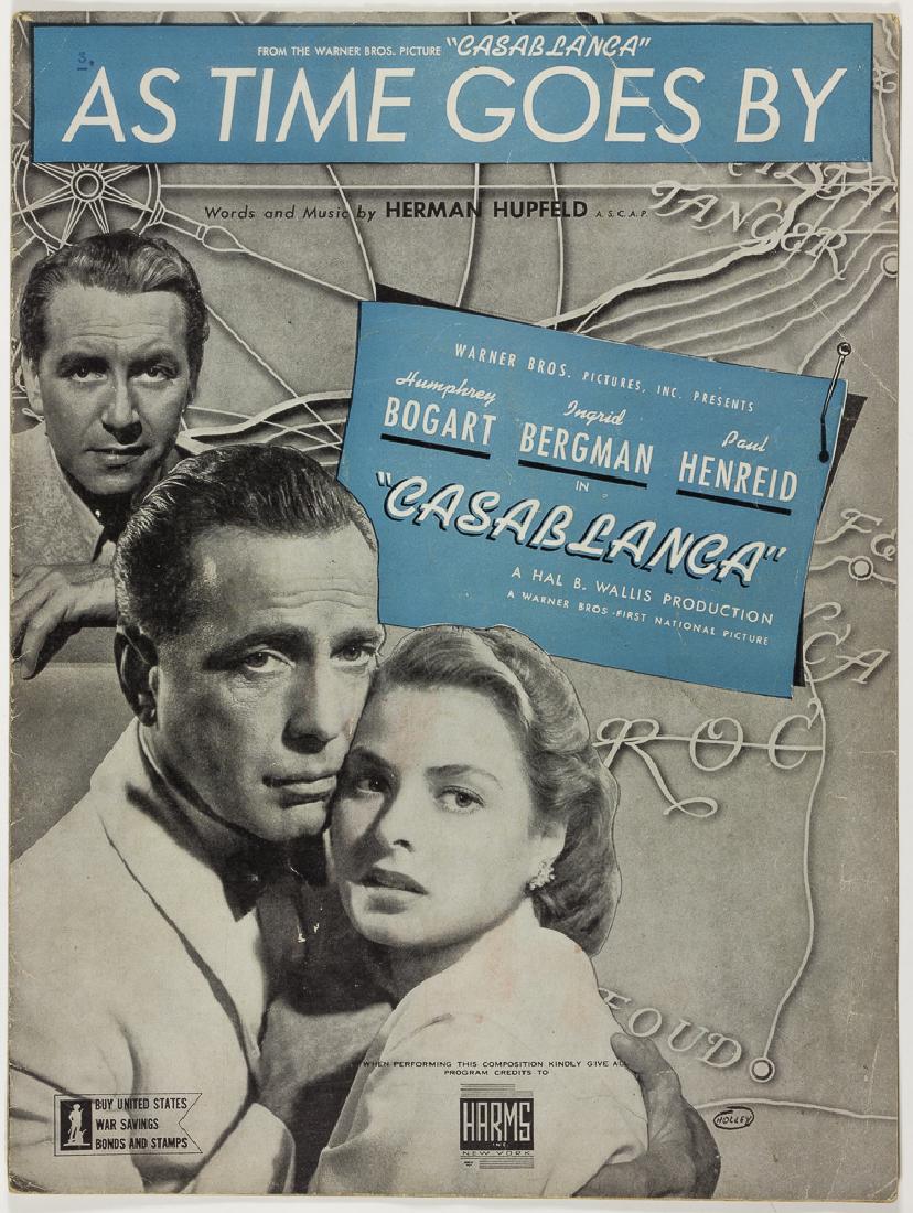 AS TIME GOES BY" SHEET MUSIC FROM "CASABLANCA: "AS TIME GOES BY" SHEET MUSIC FROM "CASABLANCA" Scarce contemporary sheet music from the classic Warner Bros. film, "Casablanca". The 8pp. 9" x 12" piece bears photos of stars Humphrey Bogart, Ingrid