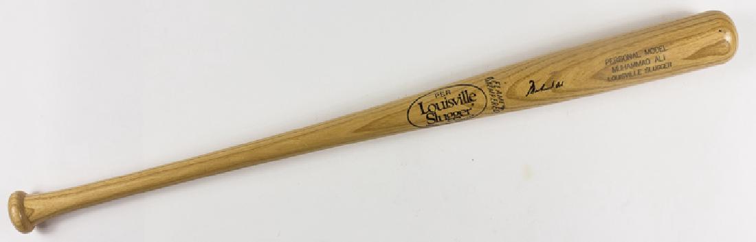 MUHAMMAD ALI: MUHAMMAD ALI (1942 - 2016) American boxer and three time heavyweight champion, stripped of his title for refusing military service. An unusual signed Ali item, a "Personal Model Muhammad Ali Louisvill
