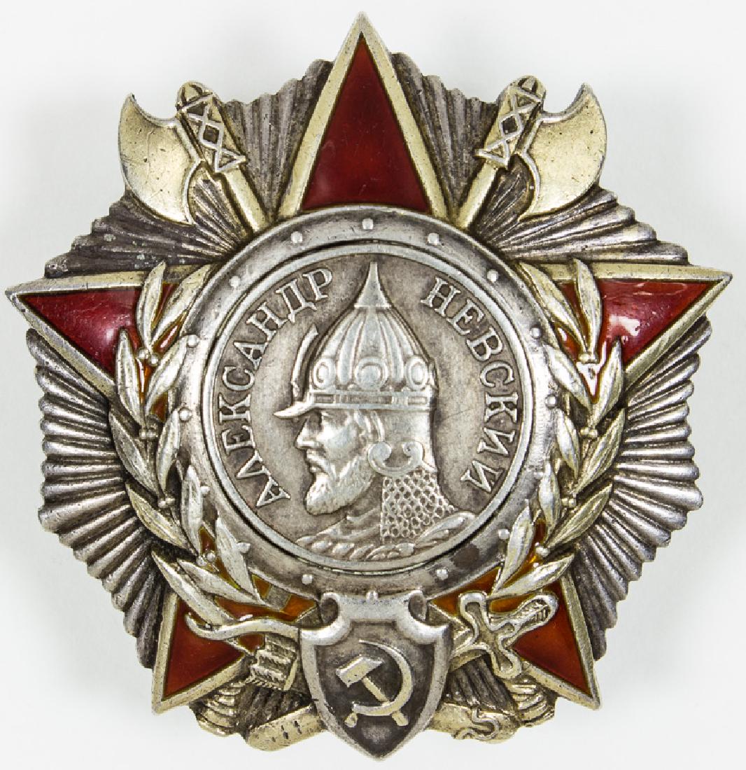 ORDER OF ALEXANDER NEVSKY AWARDED A MACHINE GUN: ORDER OF ALEXANDER NEVSKY AWARDED A MACHINE GUN BATTALION LEADER Scarce Soviet Order of Alexander Nevsky, Type 3 screw back, solid silver with gold plating which remains largely intact, partially enam