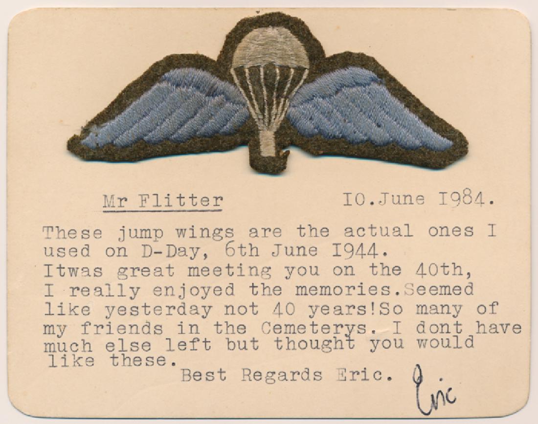 BRITISH CLOTH PARATROOPER WINGS WORN ON D-DAY: BRITISH CLOTH PARATROOPER WINGS WORN ON D-DAY Desirable pair of British cloth embroidered paratrooper wings removed from the uniform of a British soldier and mounted to a card bearing typed provenance