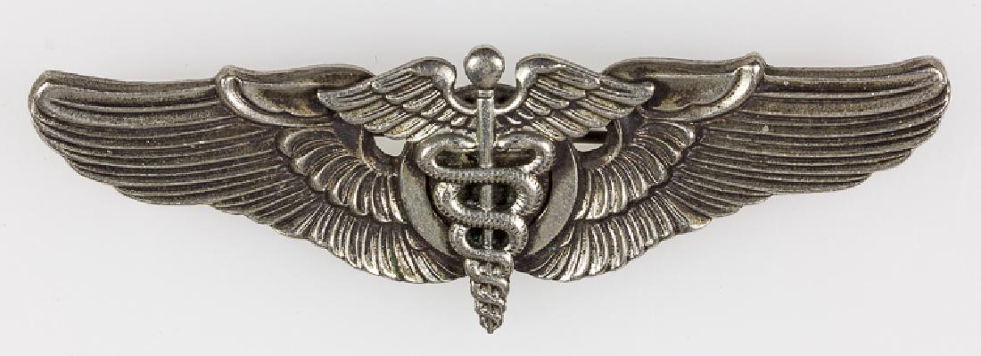 FLIGHT SURGEON WINGS BY MEYER: FLIGHT SURGEON WINGS BY MEYER Flight Surgeon Wings by Meyer and hallmarked with "N.S. MEYER INC. NEW YORK" and shield on the reverse, 3" wide, in fine condition. Pin will not open more than 90 degrees