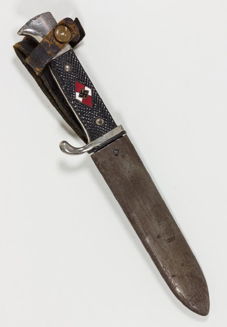 HITLER YOUTH KNIFE: HITLER YOUTH KNIFE Hitler Youth Knife by Artur Schuttelhofer & Co. of Solingen, bakelite grip in very good condition but chrome at top of grip worn in places, blade bears typical wear and is marked "R