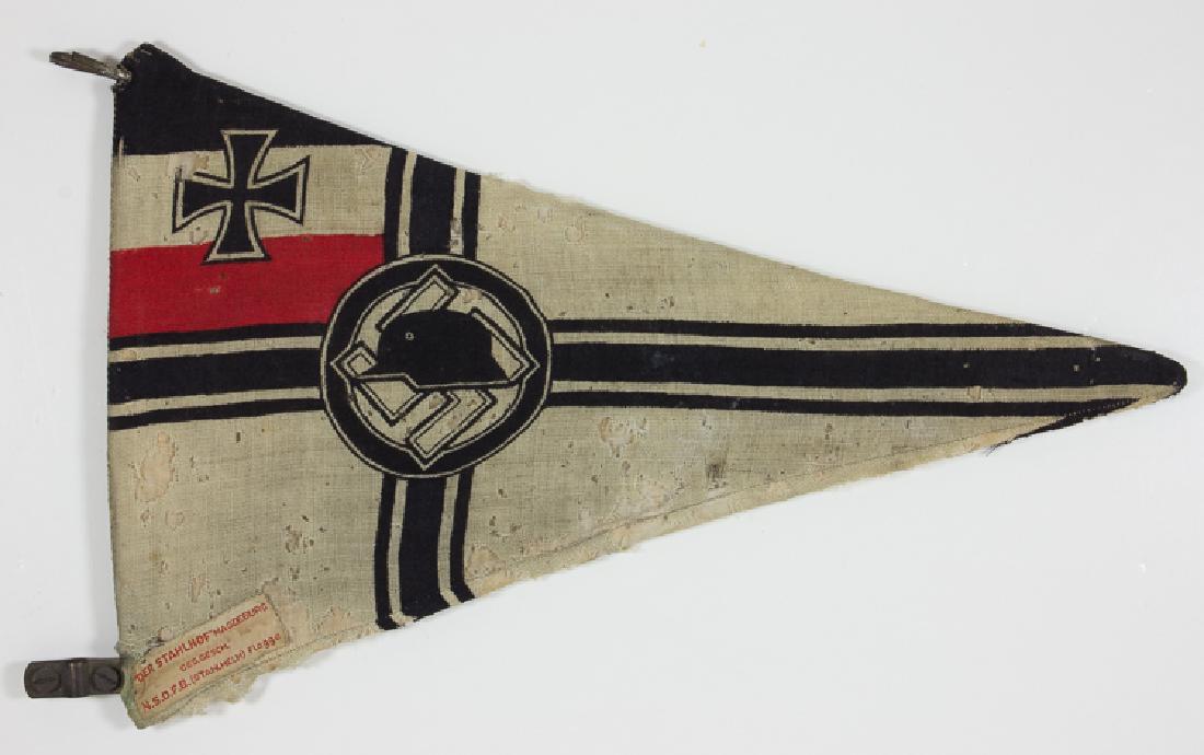 STAHLHELM AUTOMOBILE PENNANT: STAHLHELM AUTOMOBILE PENNANT Stahlhelm automobile pennant, 14" x 9", wool fabric on sturdy metal frame bearing metal screw-on and clip attachments. Maker's label from "Der Stahlhof", Magdeburg attache
