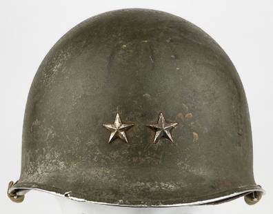 BATTLE HELMET OF MAJOR GENERAL HARRY J. COLLINS, 42ND: BATTLE HELMET OF MAJOR GENERAL HARRY J. COLLINS, 42ND INFANTRY DIVISION, AT THE BULGE AND LIBERATOR OF DACHAU The World War II M1 helmet owned and worn by Major General HARRY J. COLLINS (1895–1