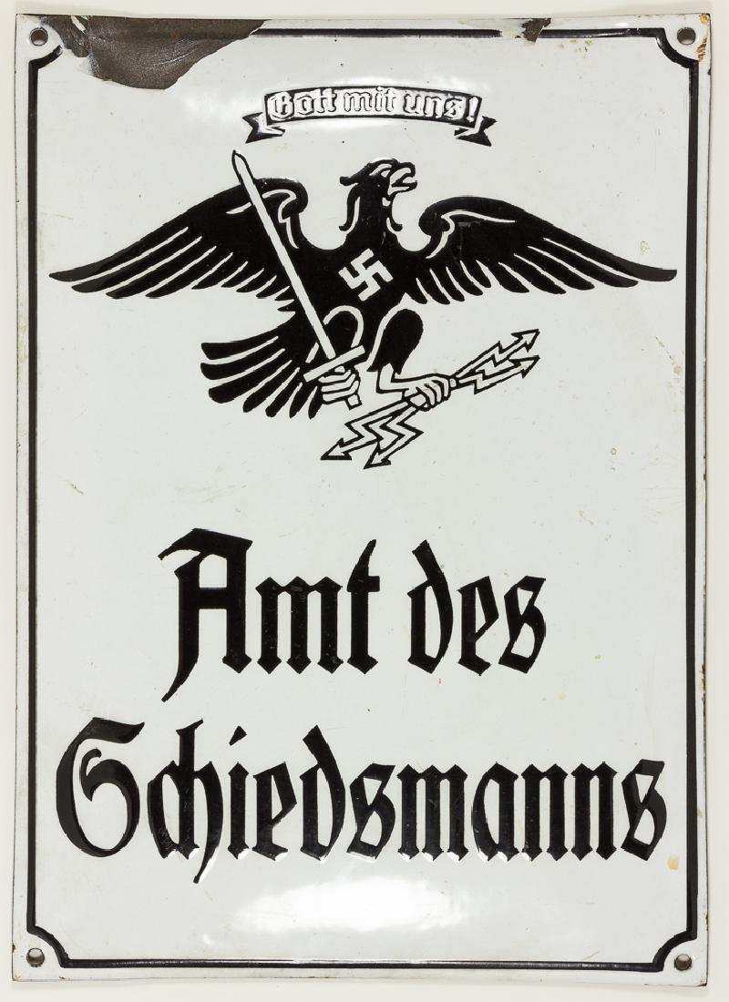 ENAMELED "AMT DES SCHIEDSMANNS" SIGN: ENAMELED "AMT DES SCHIEDSMANNS" SIGN Third Reich enameled metal sign, 10" x 14", depicting a large eagle with outstretched wings and a swastika on its breast, clutching a sword and lightning bolts in