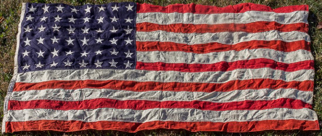 48-STAR FLAG ATTRIBUTED TO U.S.S. NORTHAMPTON, LOST AT: 48-STAR FLAG ATTRIBUTED TO U.S.S. NORTHAMPTON, LOST AT THE BATTLE OF TASSAFARONGA A significant World War II naval relic, a 48-star United States Navy flag believed to have been removed from the ill-f