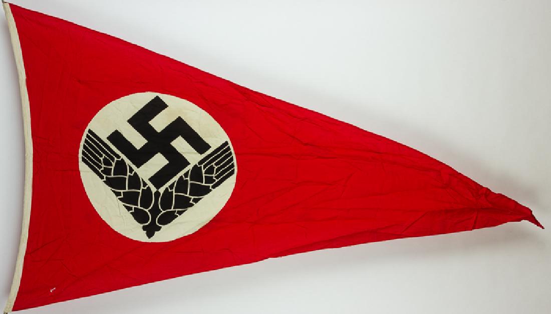 G.I.-SIGNED R.A.D. PENNANT: G.I.-SIGNED R.A.D. PENNANT Captured R.A.D. pennant, 80" x 34" overall, hoist unmarked but with hemp loops sewn at either end, the names of about 30 soldiers penned in ink but most in the same hand, pr