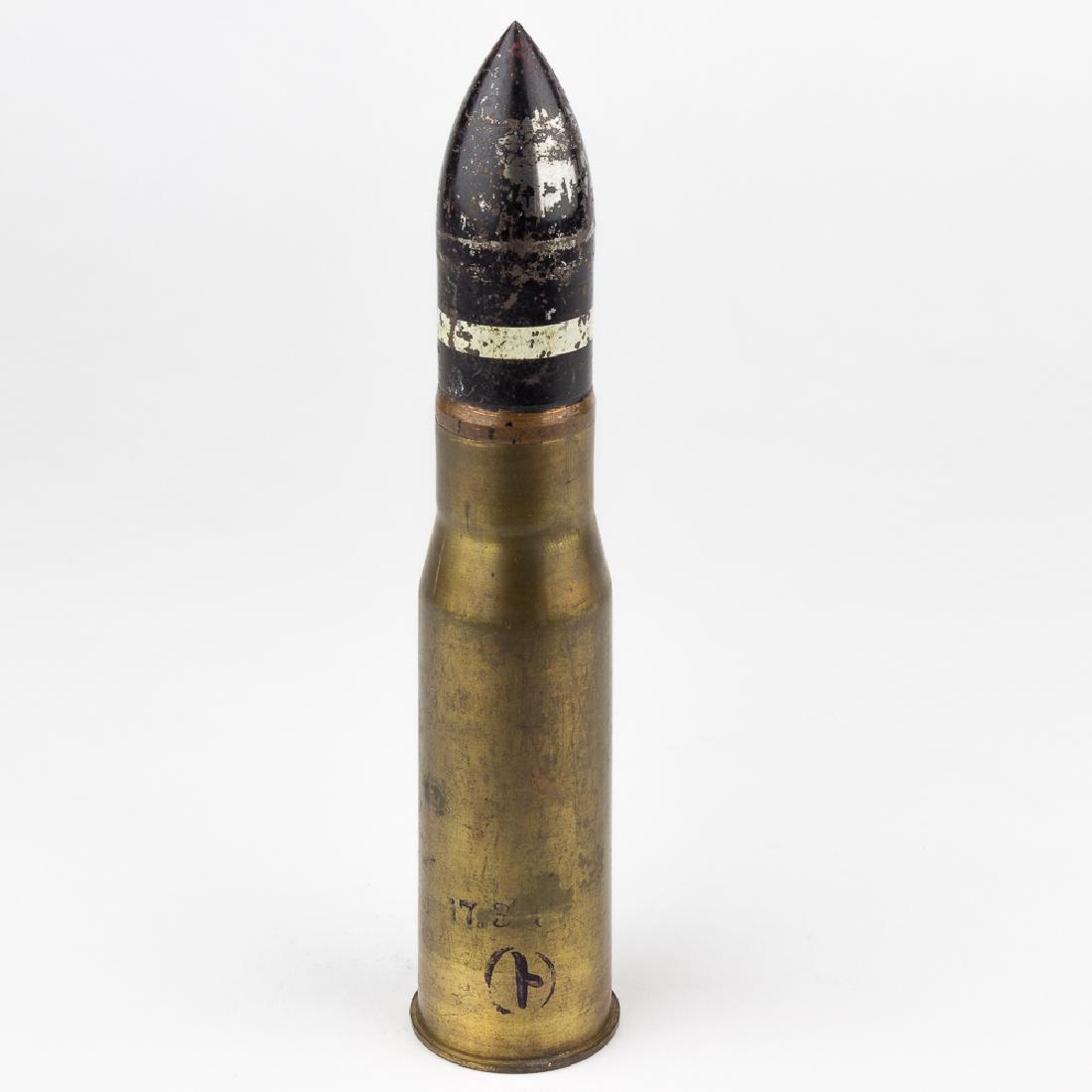 JAPANESE 37MM ANTI-TANK ROUND: JAPANESE 37MM ANTI-TANK ROUND Inert Japanese 37mm anti-tank round, 6 Â½" x 2", as used most commonly with the Type 94 anti-tank gun. The projectile is marked with a single stamped Japanese character