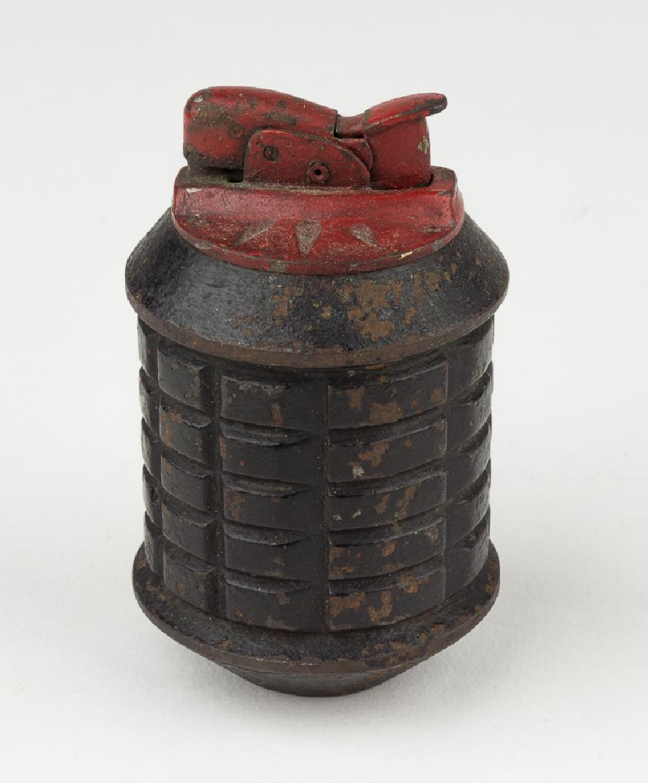 JAPANESE TYPE 97 HAND GRENADE TRENCH ART CIGARETTE: JAPANESE TYPE 97 HAND GRENADE TRENCH ART CIGARETTE LIGHTER Standard-issue Japanese Type 97 hand grenade, 3 3/4" x 2" dia., used by the Imperial Japanese Army and the Special Naval Landing Forces. The 