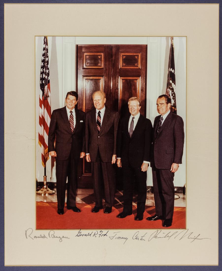 FOUR PRESIDENTS SIGNED PHOTOGRAPH: FOUR PRESIDENTS SIGNED PHOTOGRAPH Rare, original presentation I.S.P., 11" x 14" color, showing presidents RONALD REAGAN as President, GERALD FORD, JAMES E. CARTER, and RICHARD NIXON standing full leng