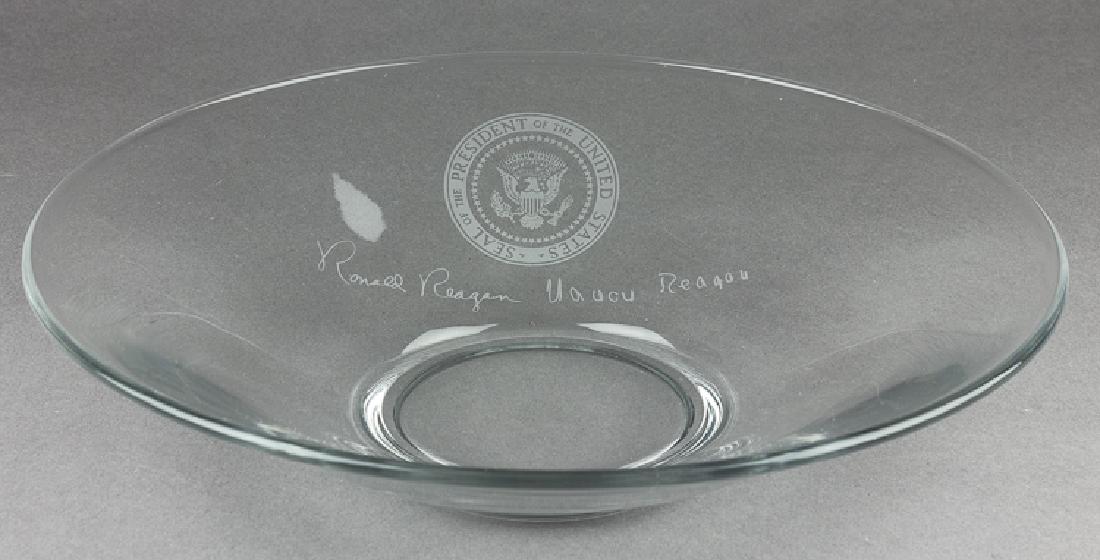RONALD AND NANCY REAGAN PRESIDENTIAL GIFT CRYSTAL BOWL: RONALD AND NANCY REAGAN PRESIDENTIAL GIFT CRYSTAL BOWL Ronald and Nancy Reagan presidential gift, a 12" dia. crystal bowl, 3" tall, adorned with an etched presidential seal and facsimile signatures of
