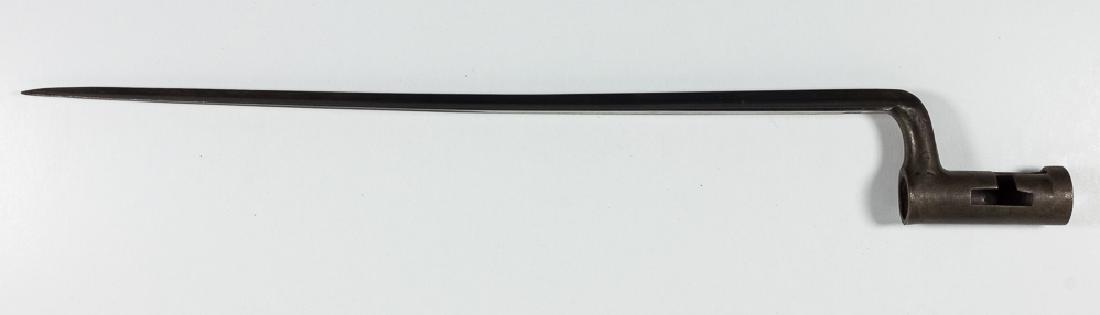 U.S. MODEL 1816 BAYONET: Triangular socket bayonet for the US M1816 musket, 15 3/4" blade, 18 3/4" overall, with a 3" socket. The blade is deeply stamped: "US/TA" indicating that it was made for the US government by blacksmit