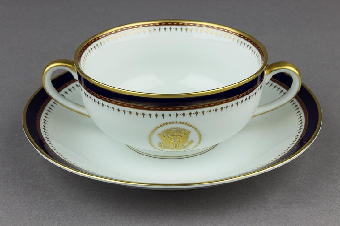 RONALD REAGAN WHITE HOUSE BOUILLION BOWL AND SAUCER: Ronald Reagan White House china bouillon bowl with matching saucer, by china makers Robert C. Floyd. This design was an informal pattern also used aboard Air Force One and at Camp David, and is seen i
