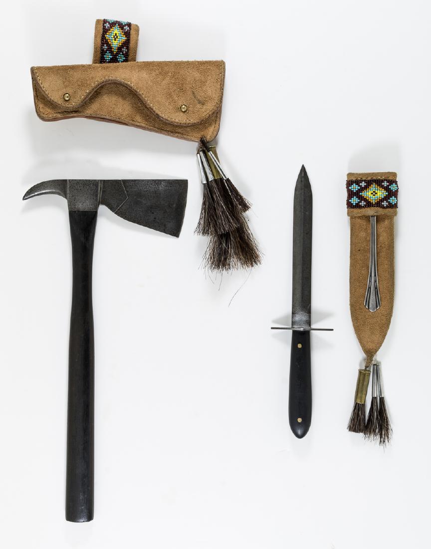 EARLY 19TH-CENTURY HATCHET AND KNIFE: Early nineteenth-century hatchet, 6 1/4" head, 13 1/4" overall, featuring a finely-forged steel head backed with a slightly curved spike poll. The slender handle is carved from very dark wood, most li