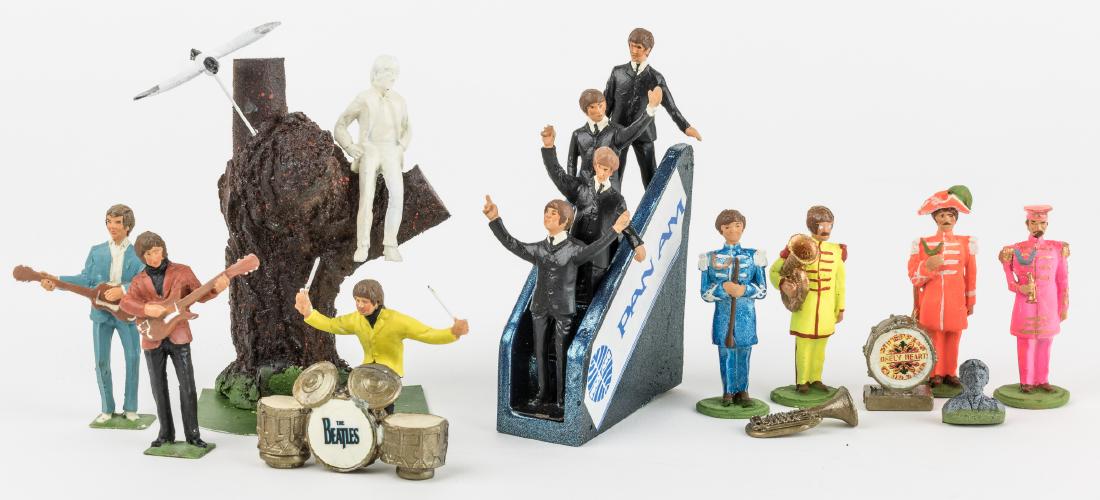 (BEATLES) "LITTLE LEAD SOLDIERS" - THREE SETS OF: Three sets of the well known hand-painted "Little Lead Soldiers" figures of the Beatles, each about 2 1/2" tall. Includes the "Free as a Bird", "Sgt. Pepper", and "Pan Am" sets, all in original boxes.