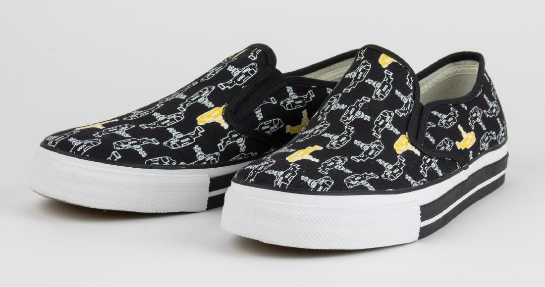 (BEATLES) BEN SHERMAN DESIGNER YELLOW SUBMARINE: Pair of designer Ben Sherman Beatles Yellow Submarine slip-on sneakers, black canvas, U.S. size 9. Never worn and in pristine condition, in original box with all original packing, inserts, etc.