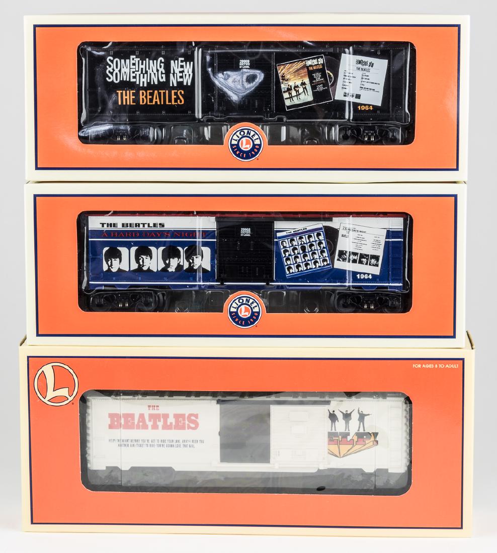 (BEATLES) LIONEL BEATLES ALBUMS BOXCARS, THREE PCS.: Fine lot of three Lionel "O" gauge boxcars commemorating various Beatles albums, including: "Help!", "A Hard Day's Night" (6-29968), and "Something New" (6-29969). All are in brand-new condition, neve