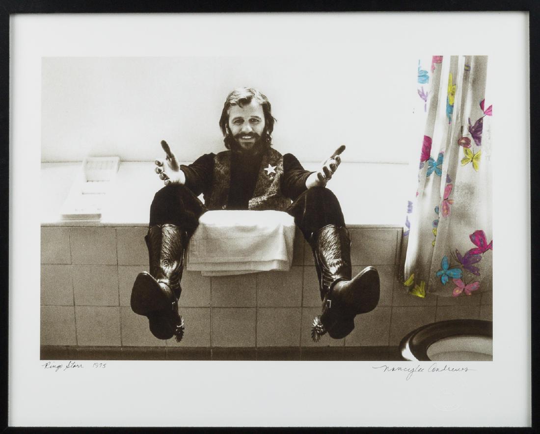 (BEATLES) NANCY LEE ANDREWS SIGNED PHOTO: NANCY LEE ANDREWS (b. 1947) Fashion model and professional photographer, engaged to Ringo Starr from 1974 to 1980. S.P. 20" x 16" color, a print of her photo of fiance Ringo Starr in cowboy boots and