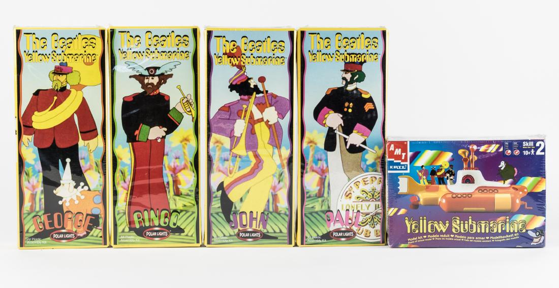 (BEATLES) SGT. PEPPER PLASTIC MODEL KITS: Lot of five Beatles Sgt. Pepper/Yellow Submarine plastic model kits, includes four 1999 Polar Lights kits, one for eack Beatles, and an ERTL 1999 kit for the Yellow Submarine. All are in new condition