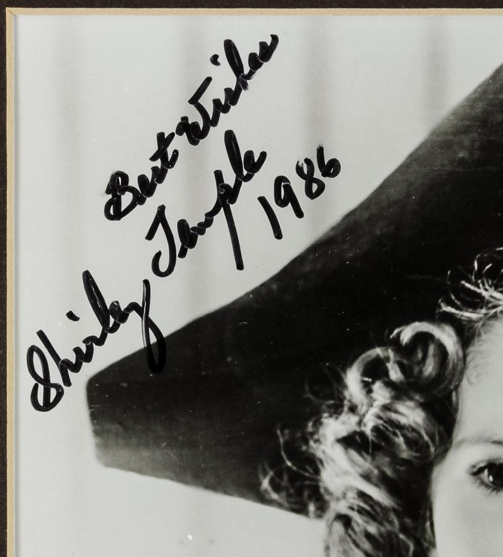 SHIRLEY TEMPLE: (1928 - 2014) Child film star of the Thirties who sang and danced with Bill "Bojangles" Robinson in many films and became a national sensation. Nice S.P., 8" x 10" b/w, a still from an early picture s
