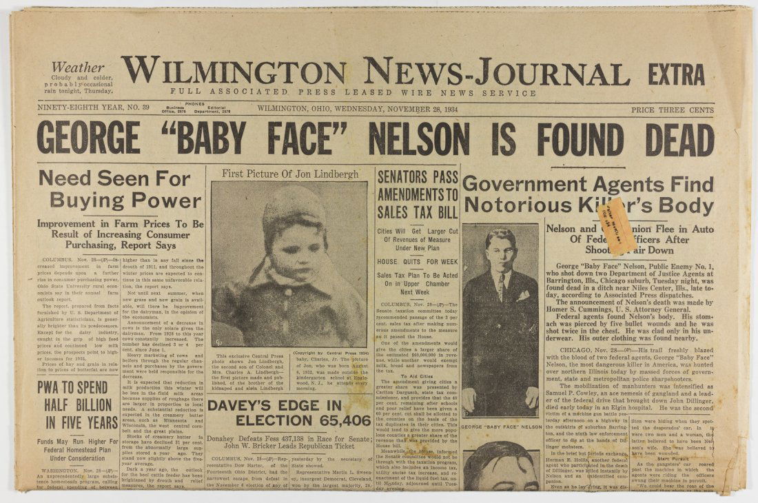 NEWSPAPER REPORTS THE DEATH OF "PRETTY BOY" FLOYD: Historic newspaper, the October 23, 1934 edition of the Wilmington, Ohio "News-Journal", 18pp. folio, announcing the death of notorious Depression-era bank robber Charles "Pretty Boy" Floyd. The front