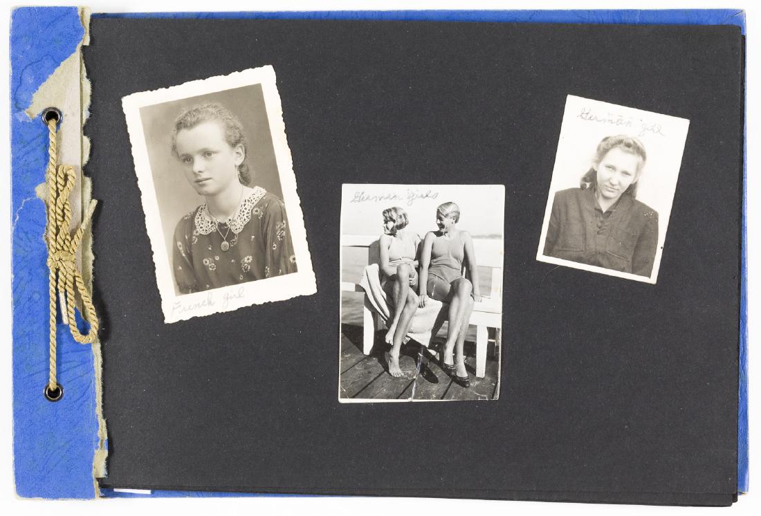GERMAN ANTI-AIRCRAFT GUNNER'S PHOTO ALBUM: Small photographic album compiled by a member of a German flak battery, includes about 62 mostly original images of the soldier who was stationed in France, a few girlfriends, with the majority showin