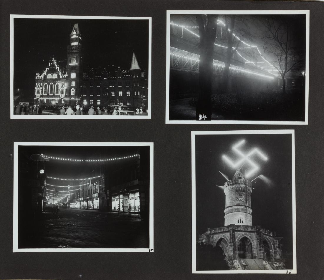 SAARLAND SOUVENIR PHOTOGRAPH ALBUM: Excellent commercial photograph album prepared as a souvenir of the rejoining of the Saar region with Germany in January, 1935. The 12 3/4" x 9 1/4" album bears a gilt title and contains within 89 pho