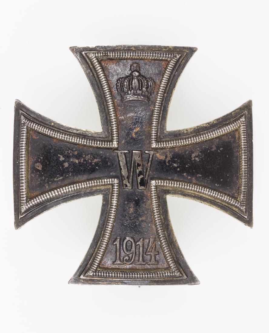 IRON CROSS, FIRST CLASS: 1914 Iron Cross, First Class, 1 1/2" square, of silver with a magnetic iron core. Fitted with a vertical pin clasp on the reverse, unmarked but for the silver content "800". Shows some tarnish overall