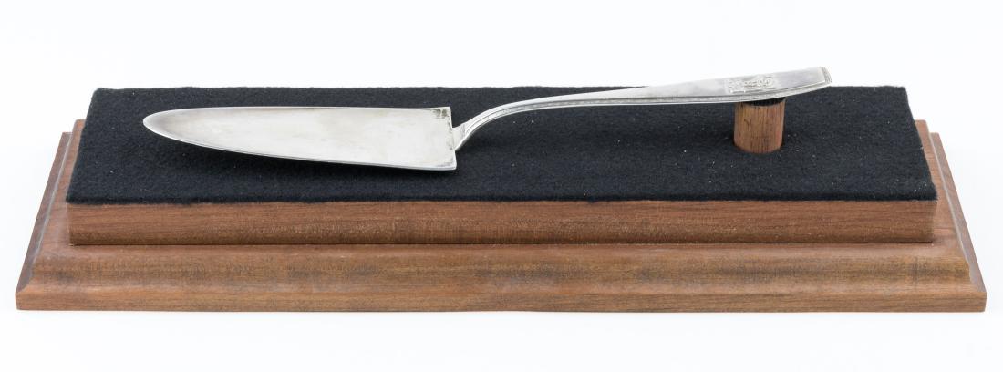 ADOLF HITLER "FORMAL" SERVING KNIFE: A most desirable piece of Third Reich silver, a serving knife, 10 1/2" x 2", originating from the "formal" pattern of silverware sets crafted for Adolf Hitler by P. Bruckmann & Sohne of Heilbronn. The