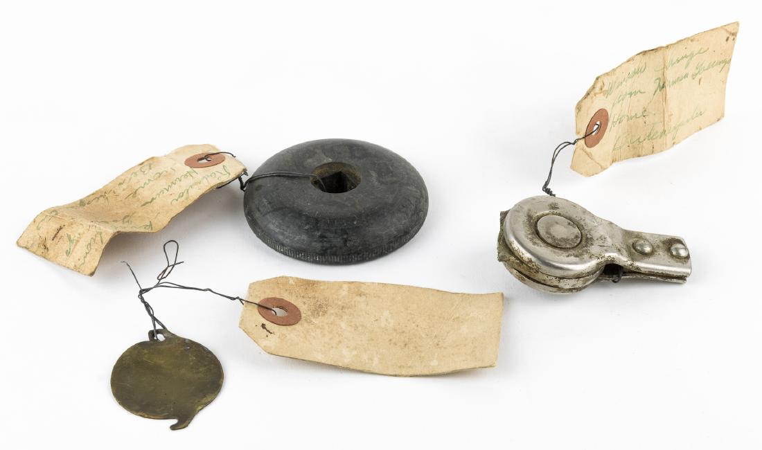 RELICS FROM HERMANN GORING'S HOME AT BERCHTESGADEN: Lot of three items taken from the ruins the Berchtegaden home of Reichsmarshal Hermann Goring. The rather mundane but nevertheless rare items include a "light socket cover", "window hinge" and a radia