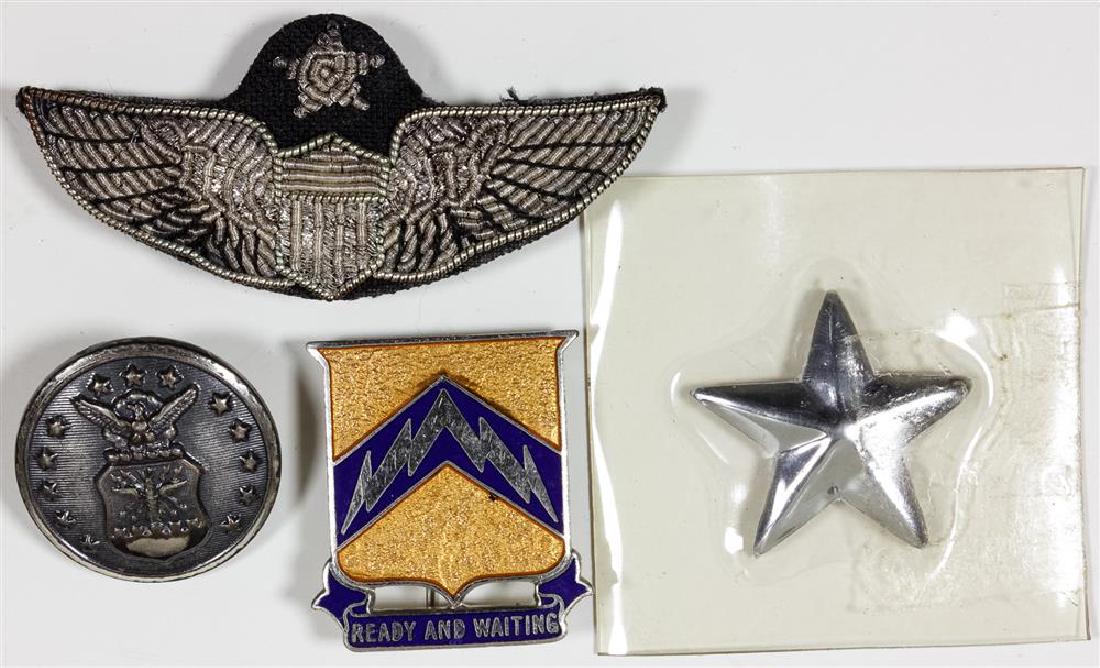INSIGNIA GROUPING OF U.S.A.F. GENERAL FREDERICK BLESSE: Good lot of four pieces of insignia, all attributed to Air Force Major General and Korean War fighter ace FREDERICK C. BLESSE (1921-2012), includes: Senior Pilot's wing insignia, 2 Â¼", embroidered 