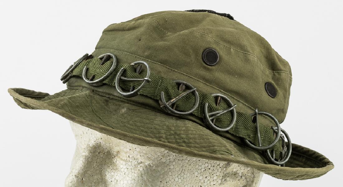 101ST AIRBORNE PERSONALIZED BOONIE HAT: Desirable Vietnam War-era "Hat, Jungle with Insect Net", colloquially known as a "boonie" hat, constructed of olive-drab cotton and wind-resistant poplin. The hat features a nylon webbing hat band wit