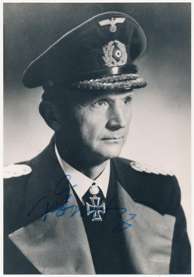KARL DONITZ: (1891 - 1980) German admiral who headed the U-Boat arm of the German Navy, later succeeded Hitler as Fuhrer after Hitler's suicide. S.P., 4 1/4" x 6" b/w, a chest up pose in uniform signed postwar in