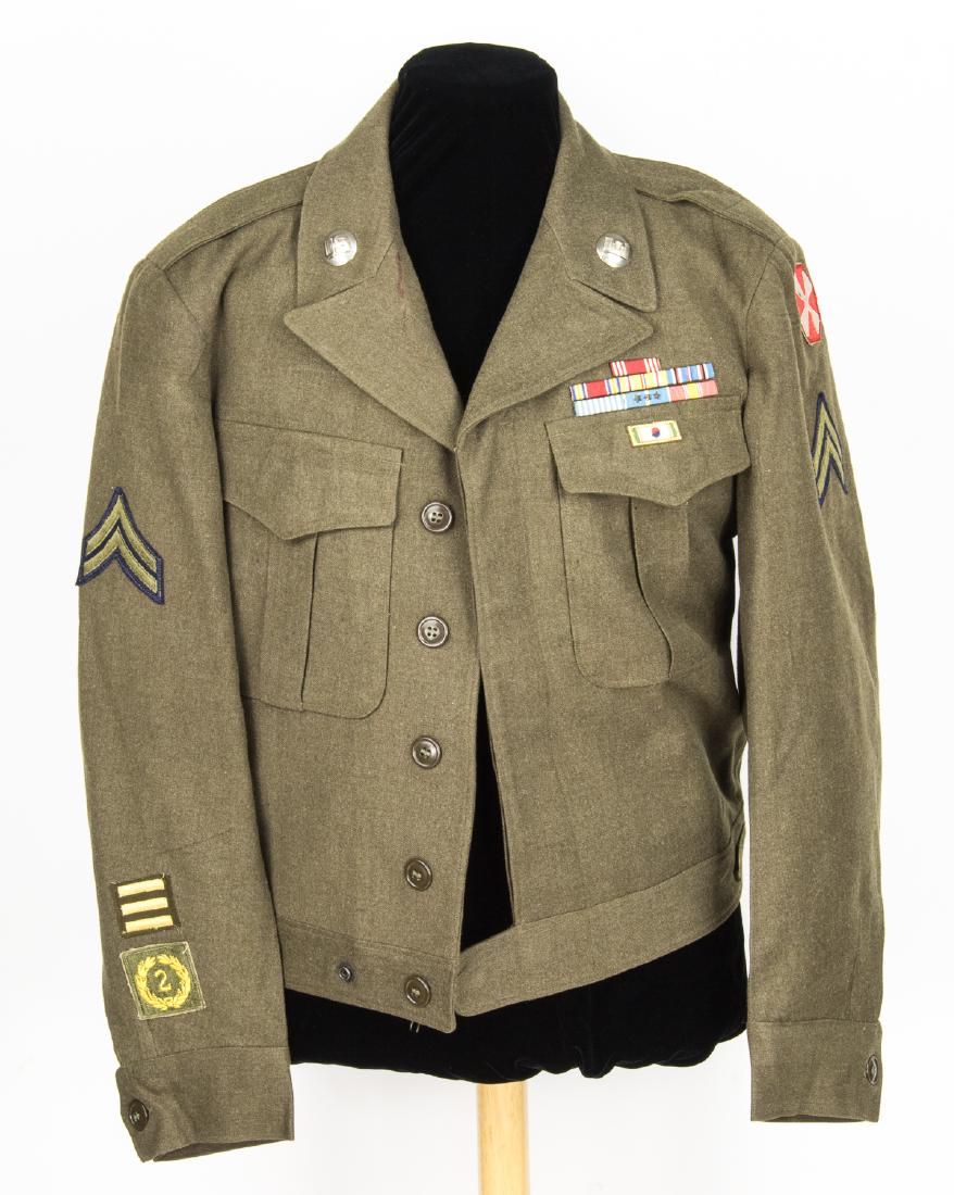 U.S. ARMY CORPS OF ENGINEER'S EISENHOWER JACKET WITH: U.S. Army M-44 "Eisenhower" uniform jacket belonging to a veteran of World War II and the Korean War, constructed of olive-green wool and bearing a fabric label giving the size "40R" inside the collar