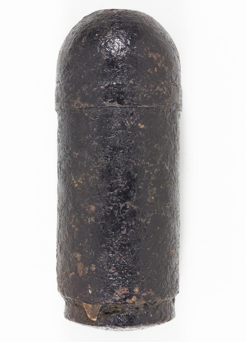 EXCAVATED CONFEDERATE READ-BROUN ARTILLERY SHELL: A fine Civil War relic, and excavated Confederate Read-Brown rifled artillery projectile, approx. 7" x 2 1/2" dia., 8 1/2 lbs., lacking its fuse and retaining only a small fragment of its copper sabot