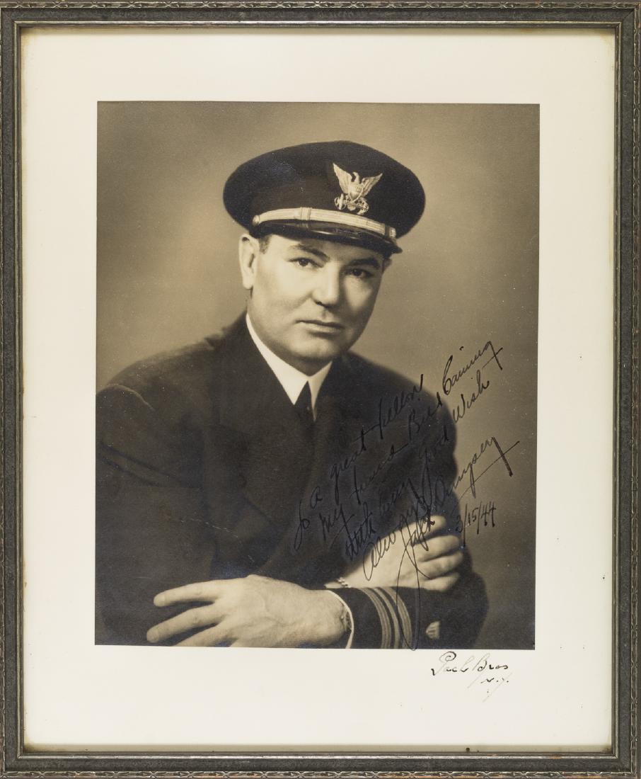 JACK DEMPSEY: (1895 - 1983) "Manassa Mauler", American boxing heavyweight champion and one of the greatest of all time. Fine I.S.P., 10" x 12 1/4" b/w (sight), a chest-up view of Dempsey in uniform as a lieutenant 