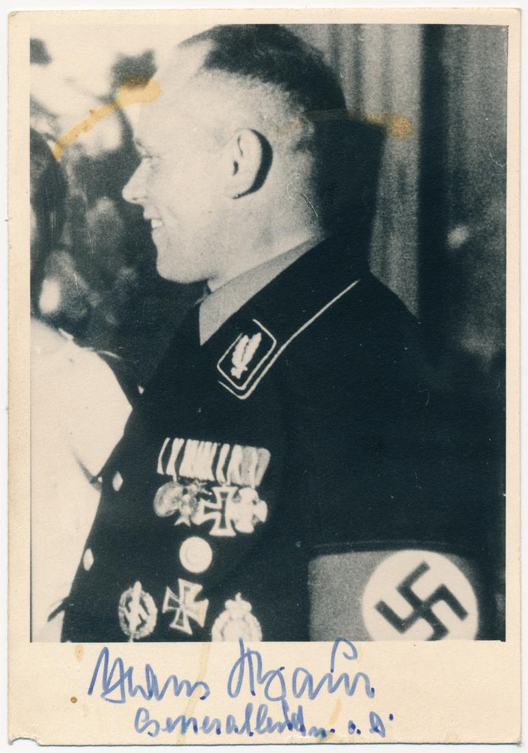 HANS BAUR: (1897 - 1993) German Luftwaffe pilot, tasked by the Luftwaffe to serve as Adolf Hitler's personal pilot. I.S.P., 3 1/4" x 5" b/w, a chest up profile view of Baur in uniform. He signs in the white marg