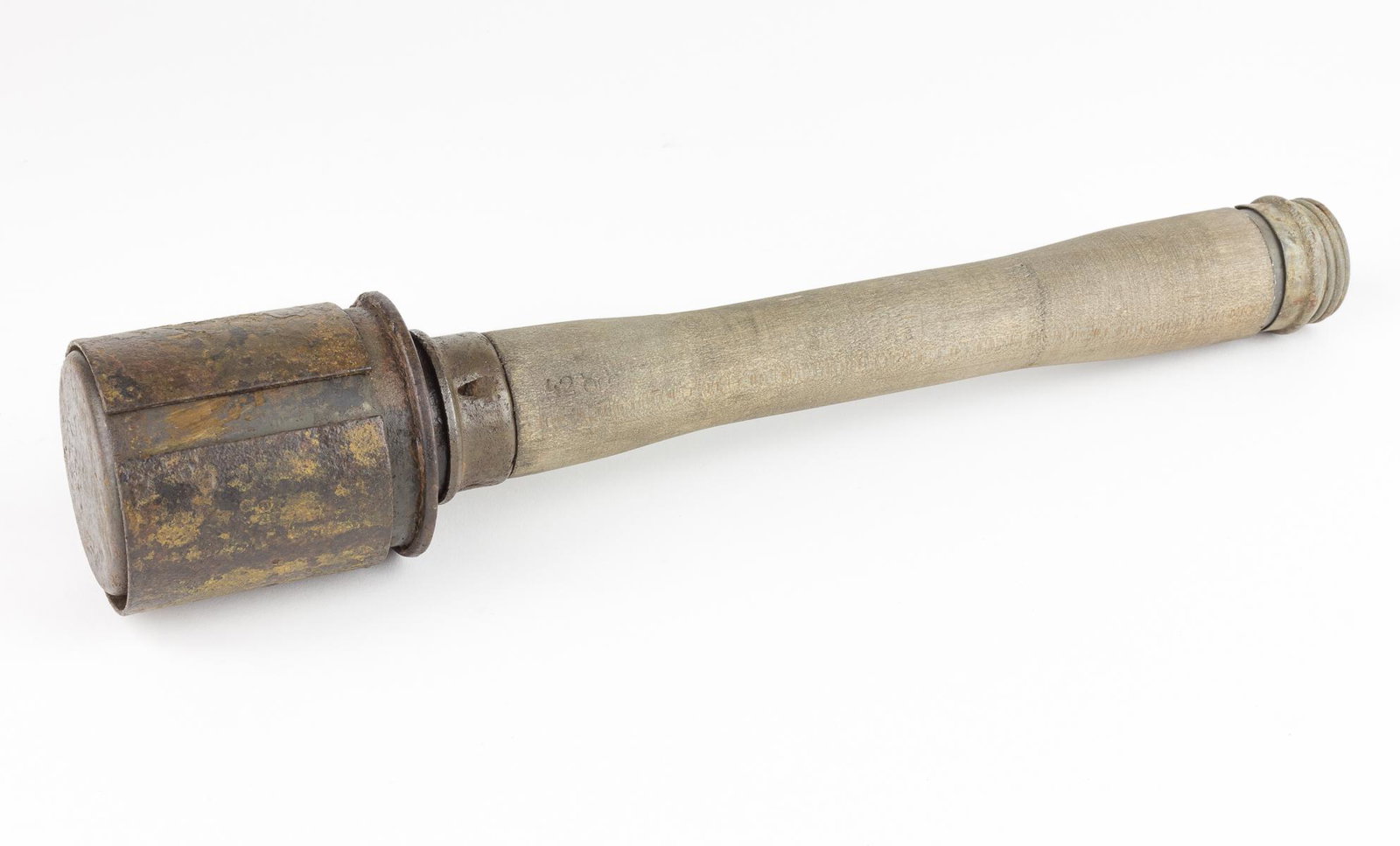 MODEL 1924 "POTATO MASHER" GRENADE: Inert German Model 1924 'steilhandgranate' ('stick grenade'), 14 in. long, the head marked with the date '43' and the manufacturer code 'dbk', for the Richard Rinker GmbH factory in Neubrandenburg. Th