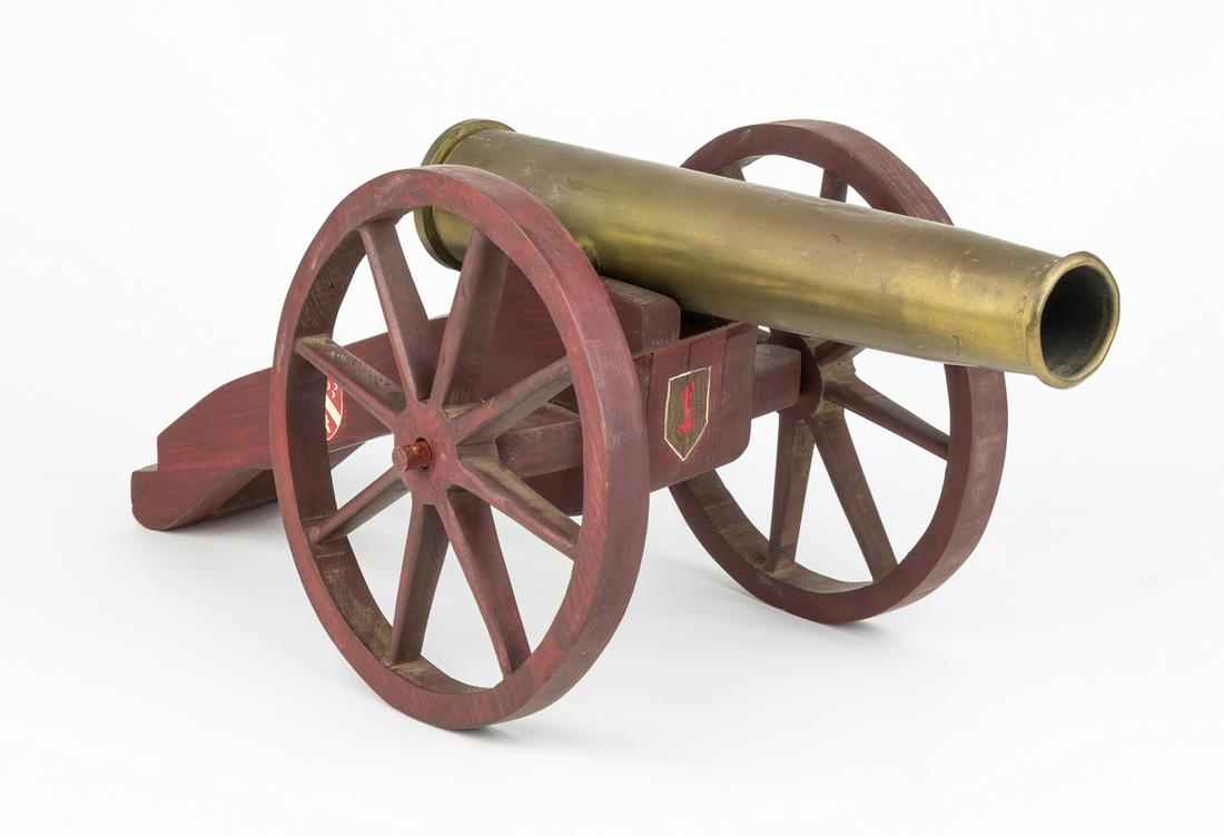 GEN. HUEBNER 'TRENCH ART' CANNON MODEL: GEN. CLARENCE R. HUEBNER'S "TRENCH ART" CANNON MODEL, WITH 1ST INFANTRY DIVISION INSIGNIAFROM THE ESTATE OF GEN. CLARENCE R. HUEBNER, COMMANDER OF THE 1ST INFANTRY DIVISION IN THE FIRST WAVE AT OMAHA 