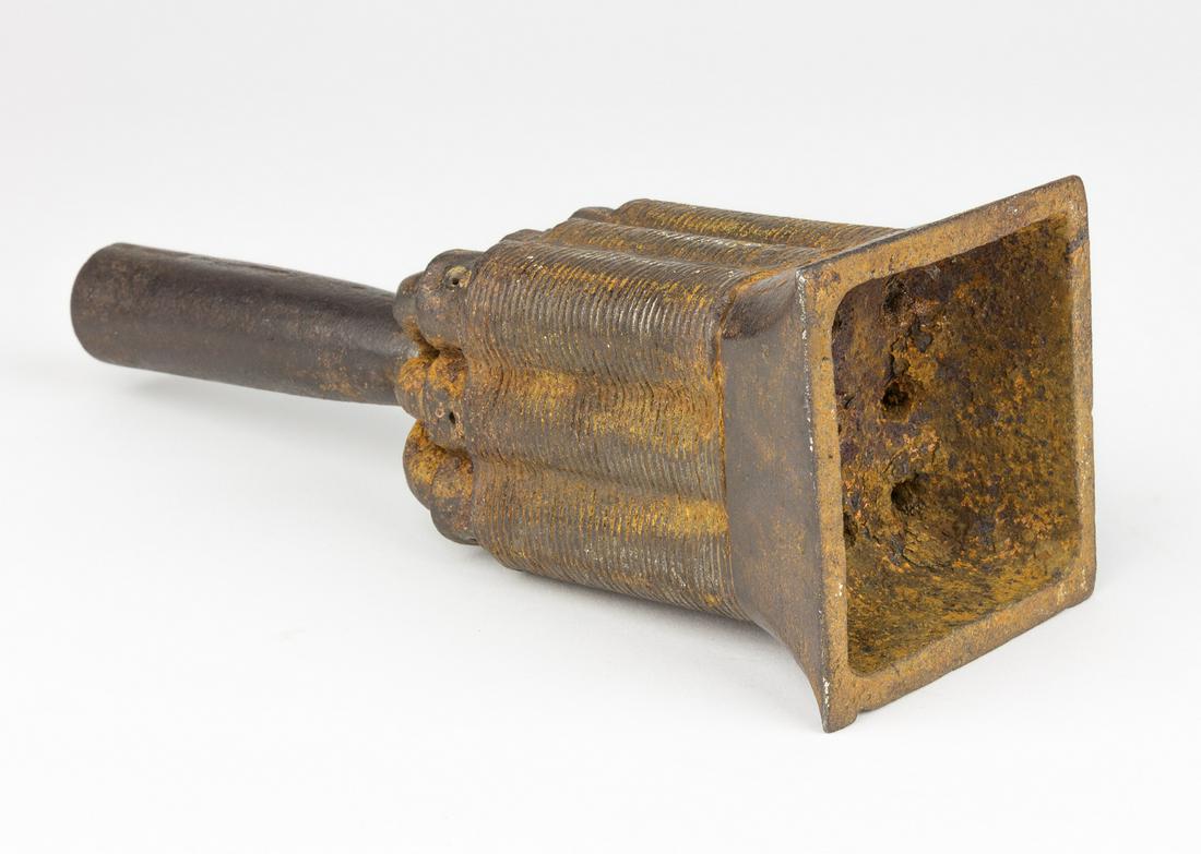 CHINESE POLE CANNON: Chinese nine-barrel pole cannon, ca. 1500-1600 AD, approx. 9' long by 3 1/4' square, fitted with a socket allowing it to be mounted on a pole and directed toward the enemy. Each barrel features an ind