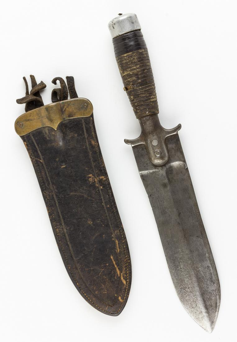 SPRINGFIELD MODEL 1880 HUNTING KNIFE: Model 1880 hunting knife produced for the U.S. Army by the Springfield Armory, 8 1/4' blade, 13' overall, showing extensive modifications accomplished during its long career. The broad spear-shaped bl