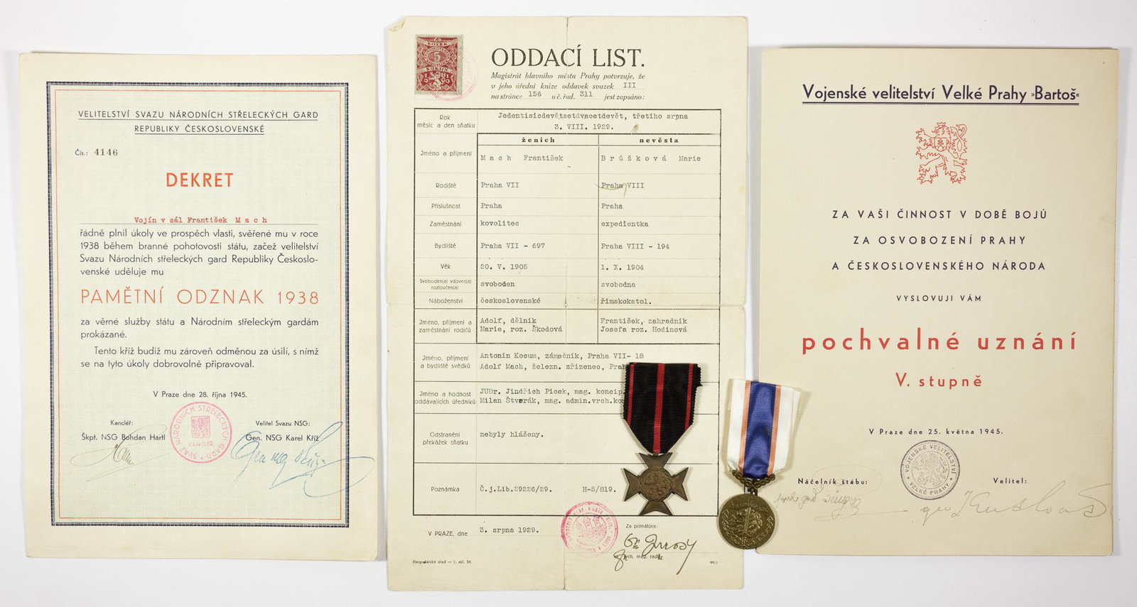 CZECH MEDALS AND CERTIFICATES GROUPING: Group of five medals, award certificates, and official documents granted by Czechoslovakia throughout World War II. Includes: certificate of commendation for the liberation of Prague in 1945, 3pp. obl