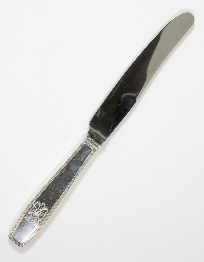 ADOLF HITLER "FORMAL PATTERN" KNIFE: Scarce knife from Adolf Hitler's formal pattern of silverware, 9.75 in. long, bears the appropriate German silver hallmarks and Hitler's personal monogrammed eagle and swastika with the edge of the ha