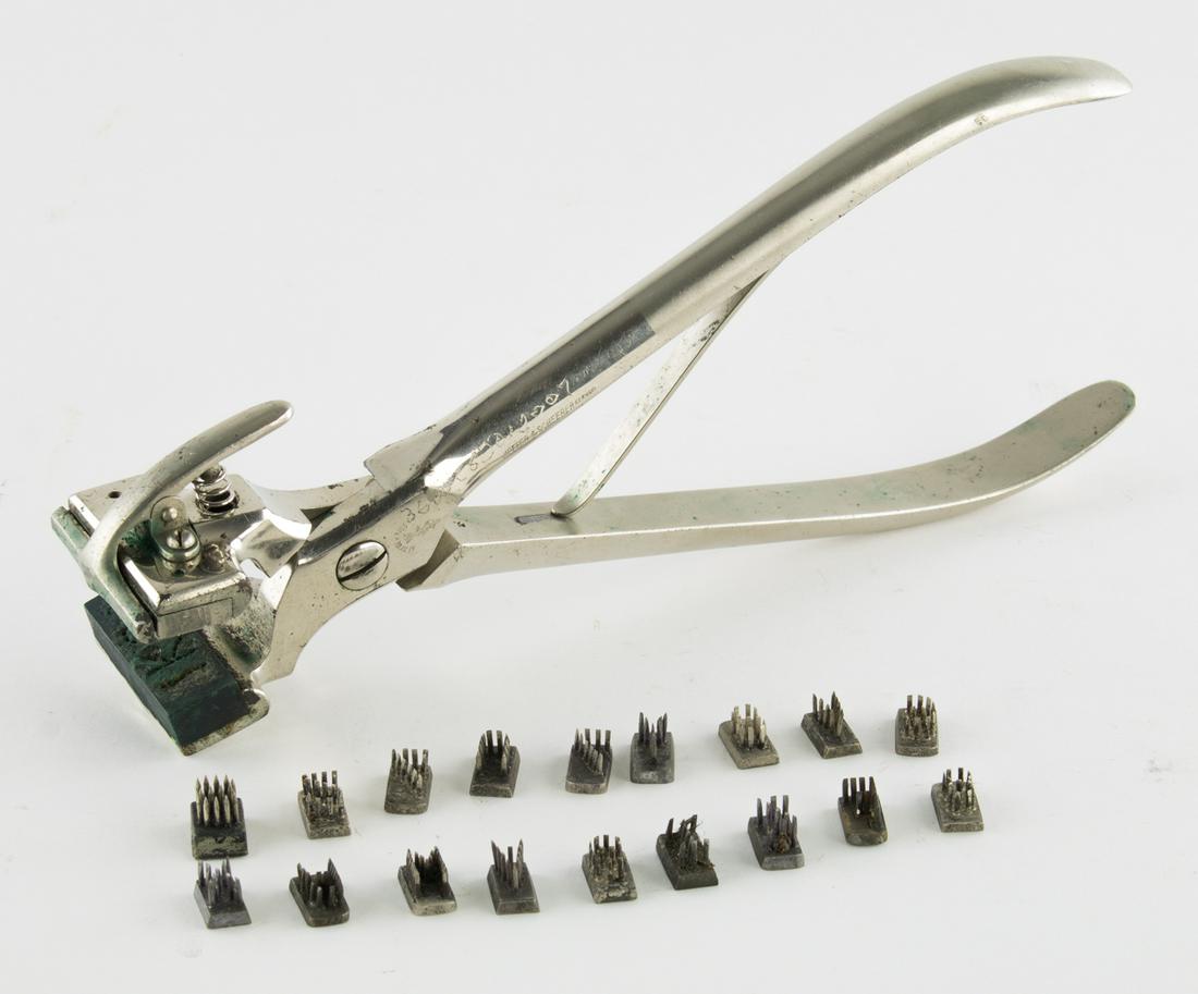 AUSCHWITZ-TYPE CONCENTRATION CAMP METAL "TATTOOING": AUSCHWITZ-TYPE CONCENTRATION CAMP METAL "TATTOOING" TOOL AND STAMPS World War II-era cased tattoo embosser made by a German manufacturer of medical surgical and dental equipment Jetter & Scheerer. The