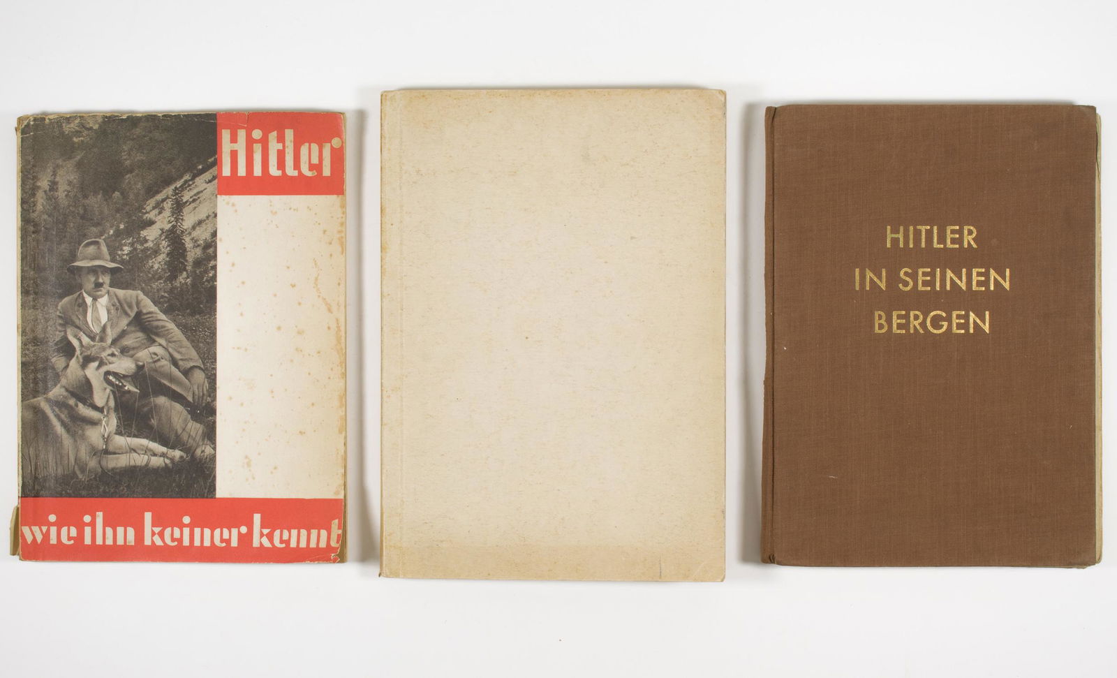 HEINRICH HOFFMANN PHOTO BOOKS OF ADOLF HITLER (3): Lot of three of mass-produced photo books edited by Hitler's official photographer HEINRICH HOFFMANN (1885-1957) who took the images contained within the books. Included is: "Hitler wie ihn keine