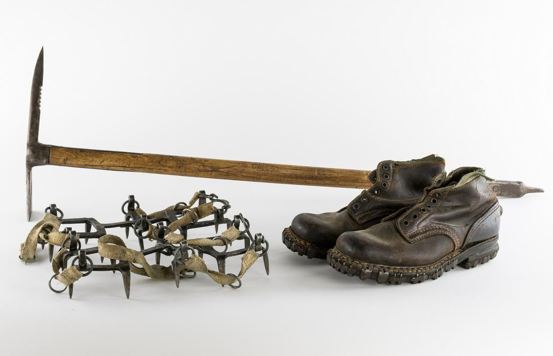 GERMAN ALPINE TROOPS' CRAMPONS, ICE AXE AND CLIMBING: Pair of "gebirgsjaeger steigeise" (crampons) very heavy-duty and hand-forged each about 12 in. long with 2 in. spikes complete with woven straps. Marked "5" on underside. SOLD WITH