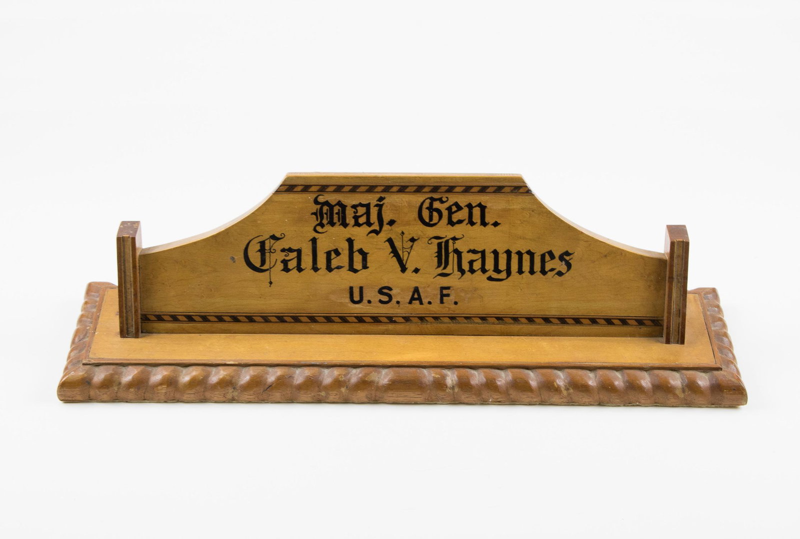 MAJOR GEN. CALEB VANCE HAYNES' DESK TOP WOOD NAME: Wood mounted gilt plaque presented to future general Caleb Vance Haynes. The plaque 15 x 12.5 in. overall is engraved: "AMERICAL LEGION TROPHY CENTRALIA AUG. 9 1928 NATIONAL GUARD AND ARMY RESERV