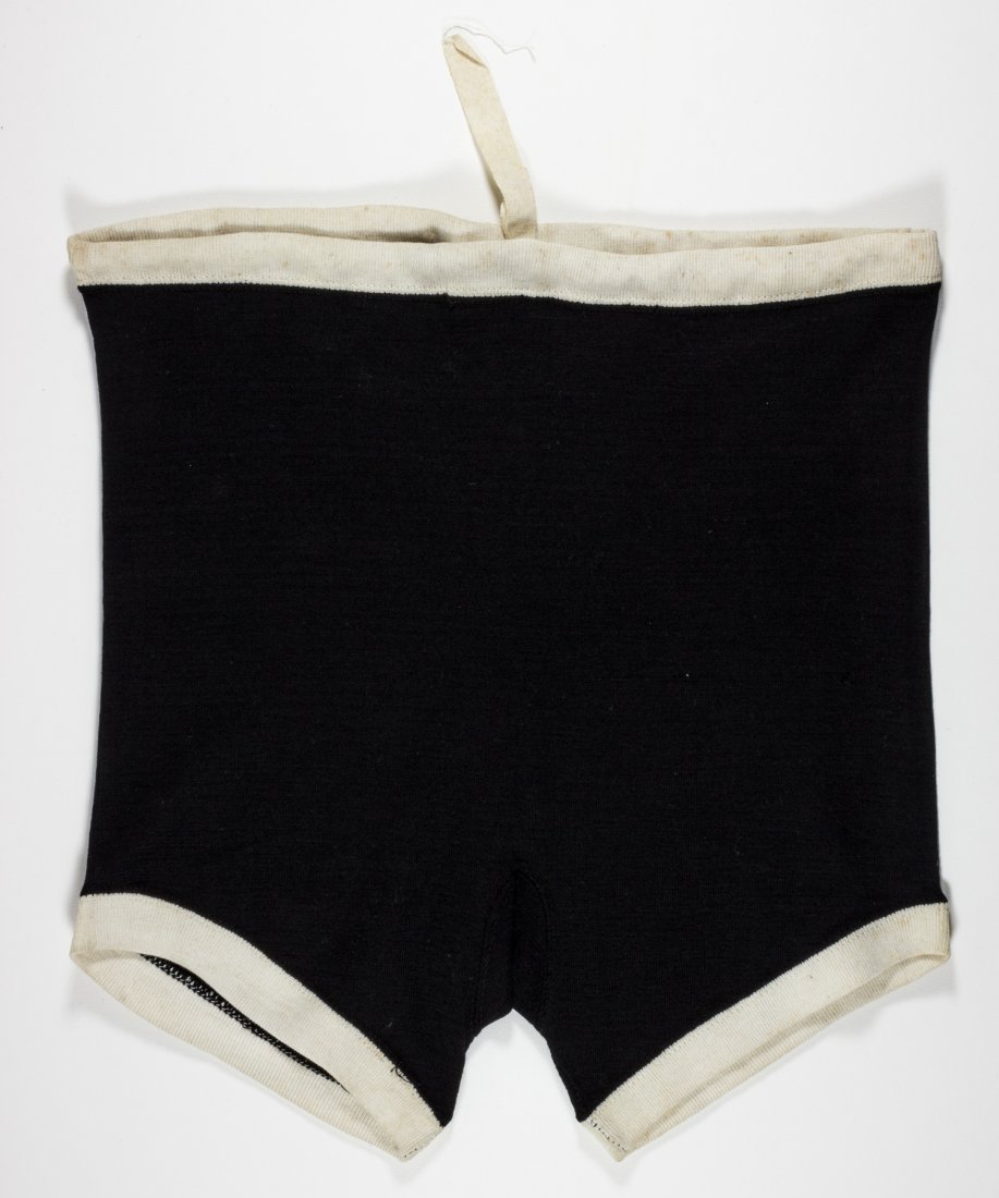 DEUTSCHE JUNGVOLK SWIM SHORTS: Pair of Deutsches Jungvolk swim shorts, 13.5 in. waist, 13 in. length. Some staining and adhesive residue on the reverse, else very good.