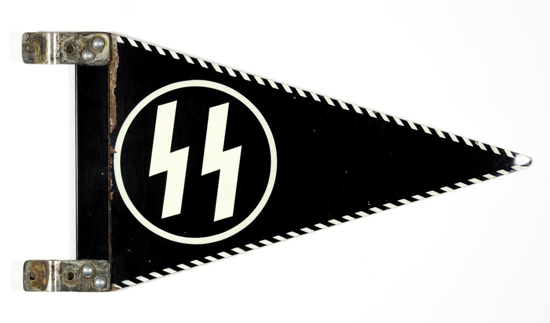 SS METAL CAR PENNANT: An especially rare SS metal car pennant. The steel pennant measures 11.5 in. long and 6.5 in. along the left side. The pennant is painted in a high gloss enamel on both sides showing the SS runes with