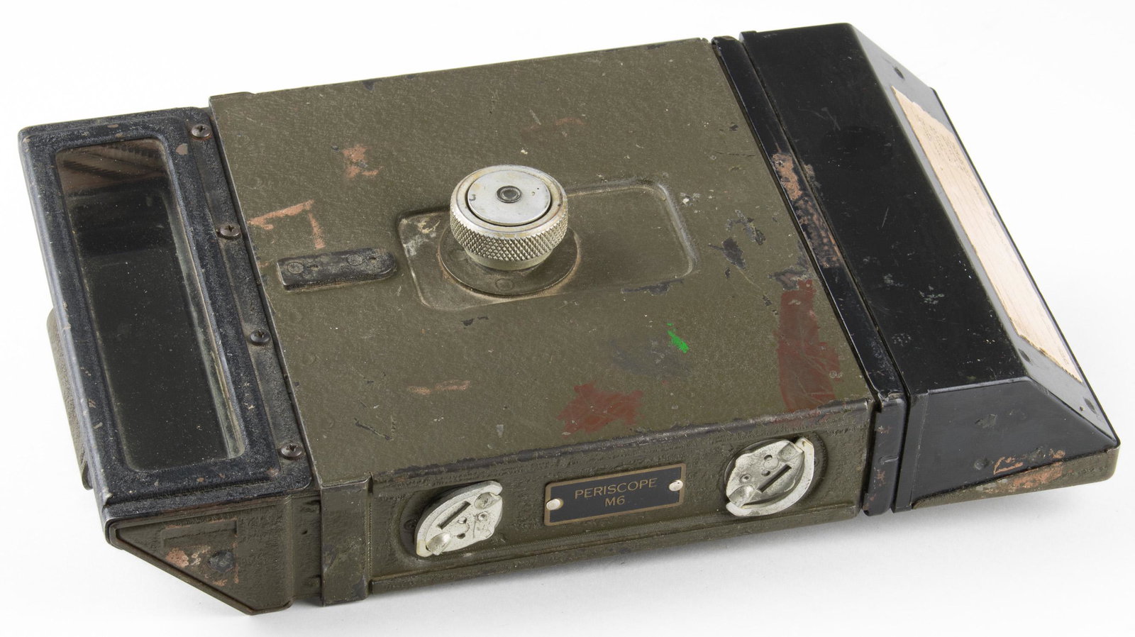 SHERMAN AND STUART TANK PERISCOPE: Type M6 Periscope, 11 x 5.5 x 1.25 in., used in U.S. WWII-era armored tanks such as the Sherman and Stuart. The periscope was mounted by inserting the unit into a bracket and hooked onto a lip The knu